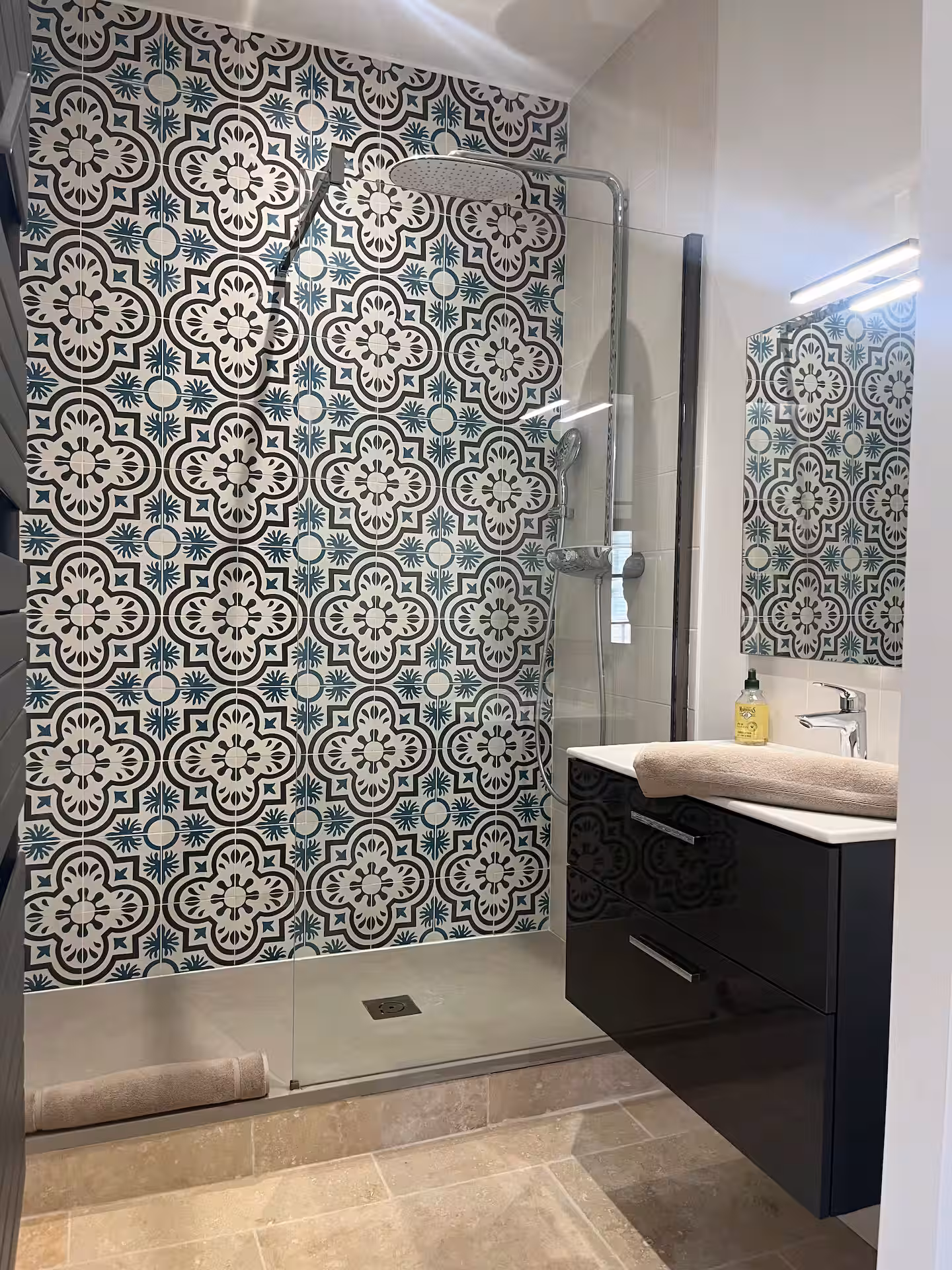 The Olive Room en-suite shower room with rainfall shower and heated towel rail